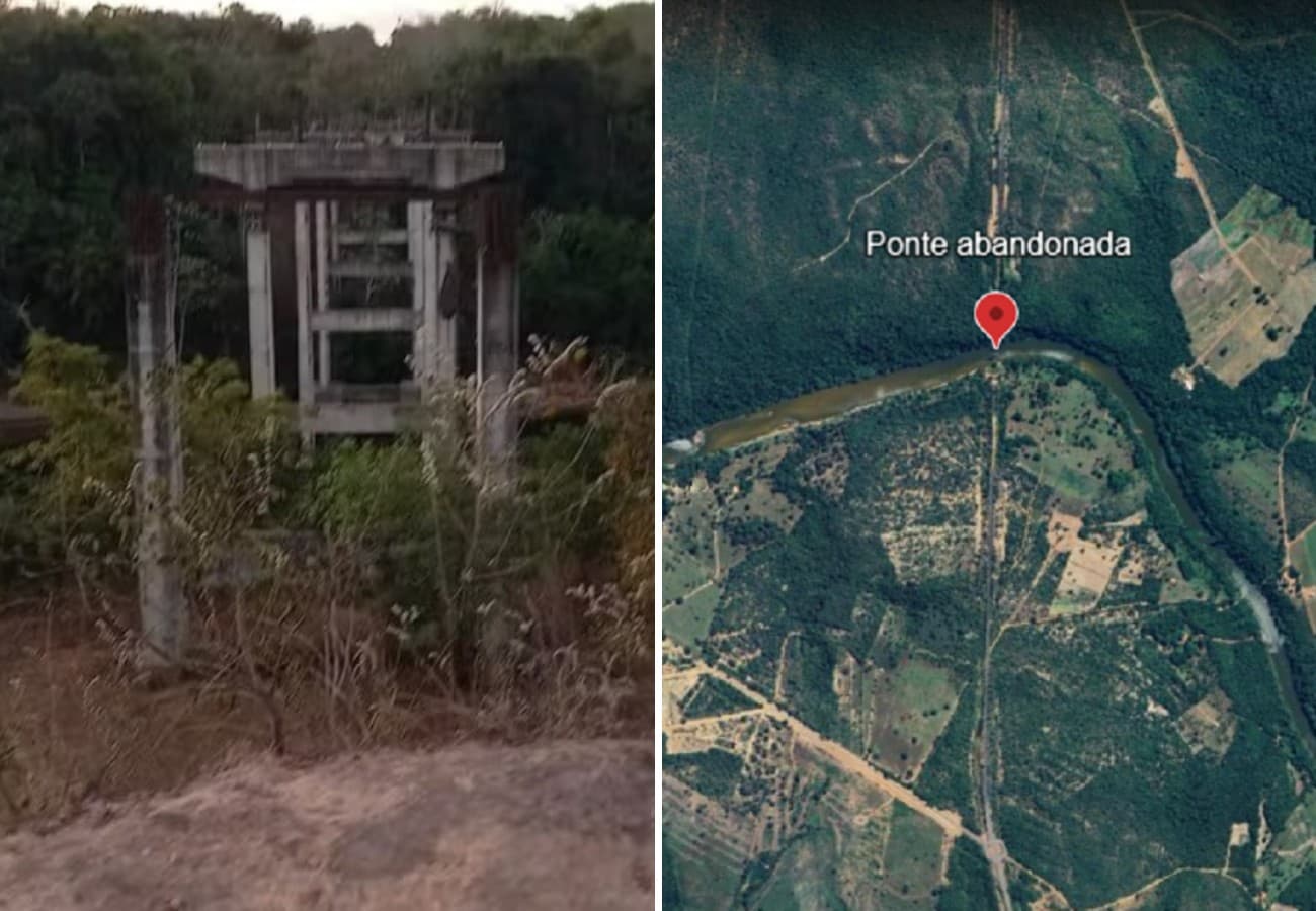 Pilares de concreto de ponte inacabada emergem acima do nível da água do rio, com vegetação ao redor.